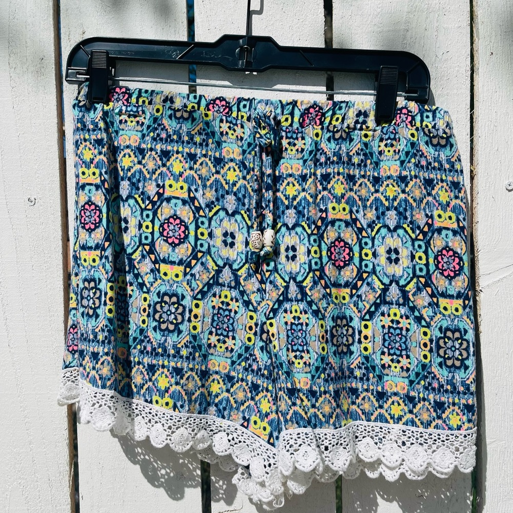 Blue shorts with pops of colors (pink, orange, green)